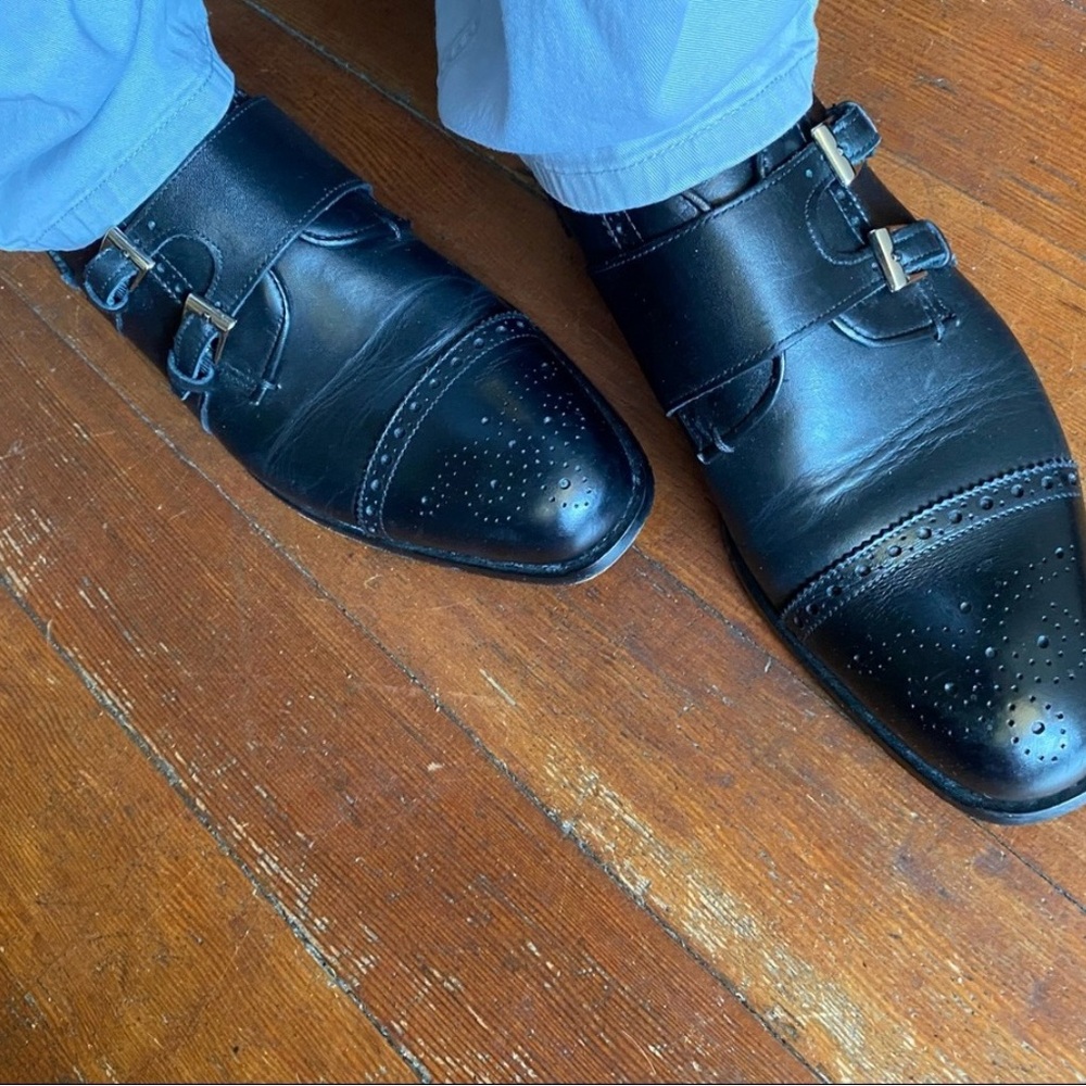 Thompson Blake Construction  black leather.